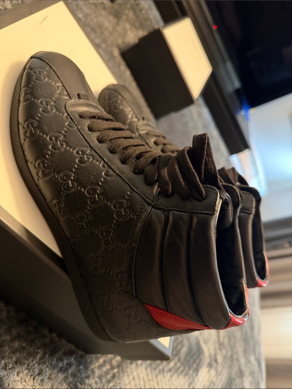 Gucci Black High-Top Sneakers with Red Heel Accent